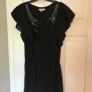 Ruffled sleeve, silver stone black dress